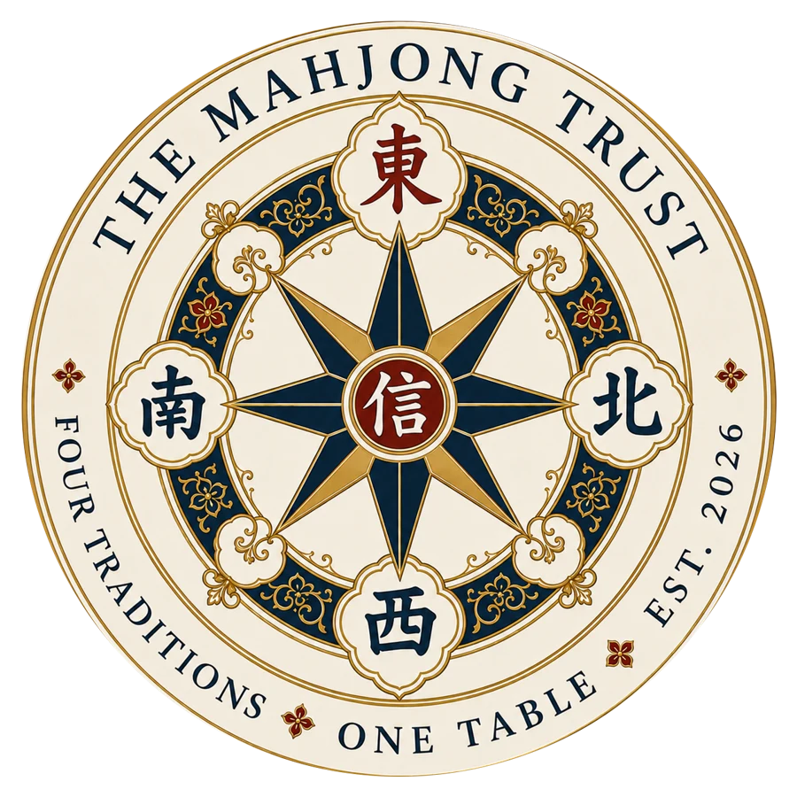 The Grand Seal of The Mahjong Trust — a four winds compass rose ringed by the words Four Traditions, One Table
